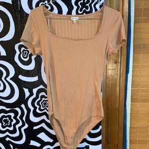 Elegant Tan Ribbed Bodysuit